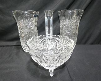 Crystal Glass Industry 24% Lead Crystal	
- 2 Crystal Glass Industry 24% Lead Crystal Vases 8.25" tall
- Crystal Footed Bowl 6" diameter x 4.5" tall
- Modern Glass Candle Stick 8.5" tall