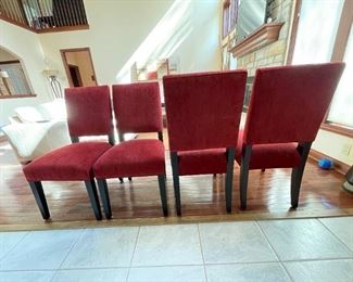 Red Dining Chairs, set of four. Mint Condition. Measurements: 40” Tall, seat width 19”, Width 20”, height from floor to seat 20”. $600 for all.