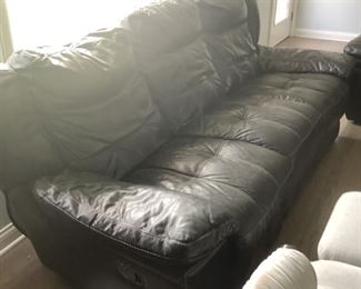 Black leather sofa measures 92” l x  39” d x 39” t.  Presale $50.