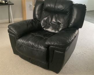 Black leather recliner.  Measures 45” w x 39” d x 39” t. Presale $95