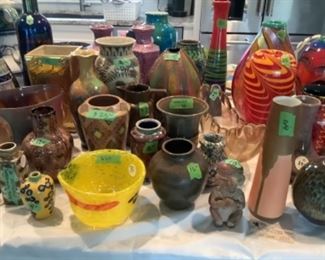 A large variety of pottery and glass...many signed and numbered by the artist