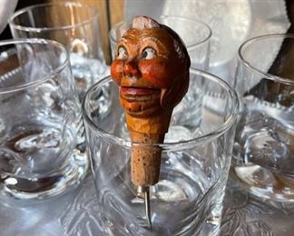 Antique German carved open mouth bottle pour