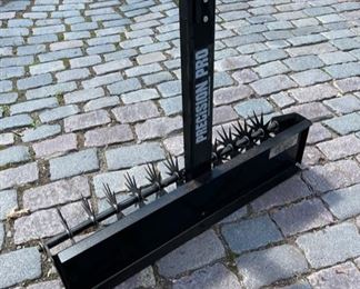 Tow behind lawn aerator