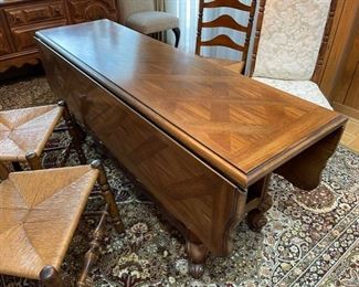 Unique side drop-leaf dining table with four ladder backs chairs