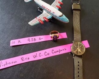 Tin United airplane, 10 k ring and Vietnam era W.C. co. Compass