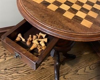 Antique gothic game table with chess pieces