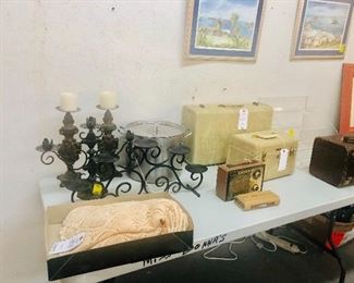 Vintage Samsonite
Luggage,
Several metal candle holders and candelabras    Register and bid online            
 http://missdonnas.hibid.com  