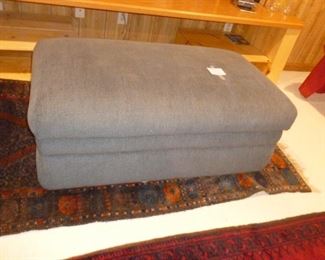 large upholstered ottoman..opens for storage