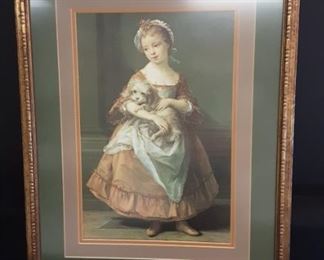 Beautifully framed vintage print of girl with puppy