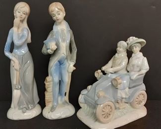 KPM Arnart Imports figurines in suttle blues and greys
