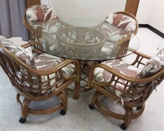 Round glass Rattan table and 4 chairs