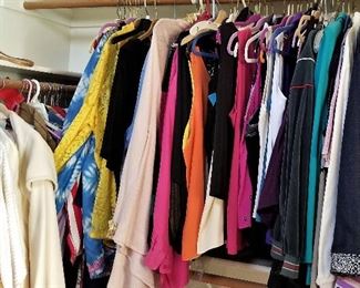 Lots of designer clothing. Some new with tags. 