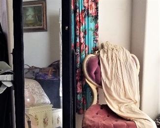 Standing floor jewelry armoire with full length mirror. Antique parlor vanity chair. 