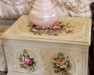 Painted roses trunk. Lots of storage. We have 2; one smaller. They can also stack.