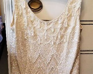 Okay, we have the most fabulous vintage clothing! Can you see this with black pants or a black skirt or even a pair of jeans? Vintage chic dresser for sale too!