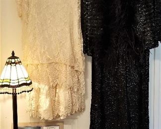 Vintage black dress and vintage cream dress.