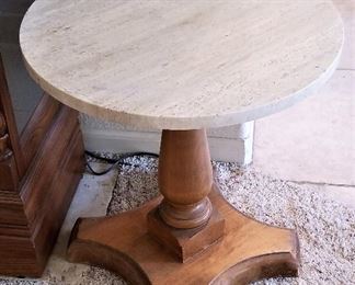 Another small round marble side table in a different style