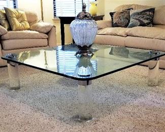 Modern glass square coffee table. Fabulous piece! Off white sofa and matching chair.