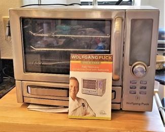 Wolfgang Puck dual electronic convection oven with rotisserie.