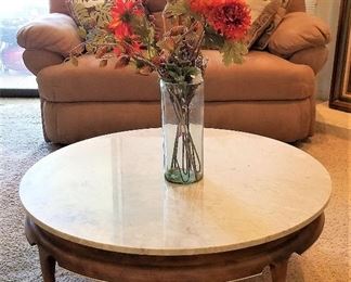 Round white and gray marble table. Great in a vintage or mid-century modern decor setting.