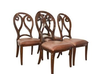 21. Four Thumb Back Dinning Chairs