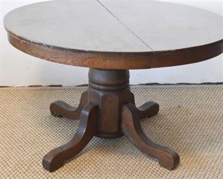 99. Antique American Round Oak Table