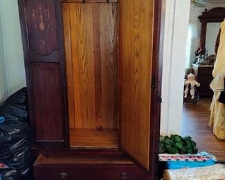 Open Door and Drawer on the Armoire