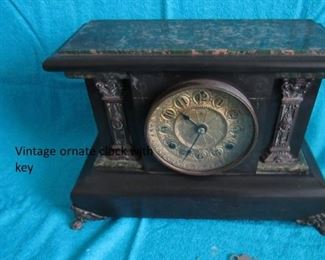 vintage ornate mantle clock, with key $150.00