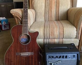 Ibanez Guitar and Donner Amplifier and 1970's fabric and wood chair