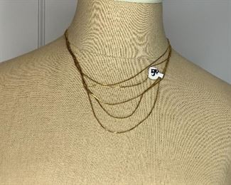 Multi strand Fashion Gold tone necklace $5
