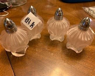 Pale pink satin type glass salt and pepper shakers $5 pair ( 2 sets available)