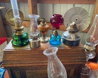 Lots of antique and vintage hurricane lanterns