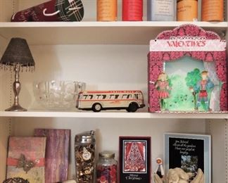 Tin Greyhound bus, art journals, Angels, candles, old buttons