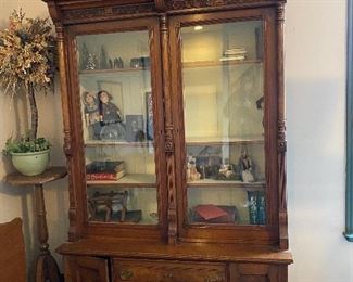Antique walnut glass front library cabinet