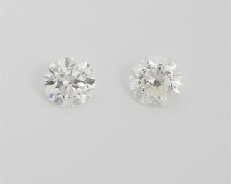 1012
Two Unmounted Round Diamonds
Including a round brilliant diamond weighing 1.31ct with GIA certificates stating H color and SI2 clarity and a round brilliant diamond weighing 1.43ct with GIA certificate stating J color and VS1 clarity
2 pieces
Estimate: $7,000 - $9,000