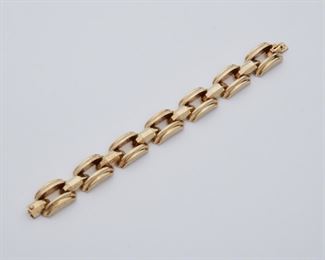2010
A Retro Gold Bracelet
14k yellow gold, stamped: PA / 585
Designed with domed rectangular links
7.25" L x .5" W
30 grams
Estimate: $1,000 - $1,500