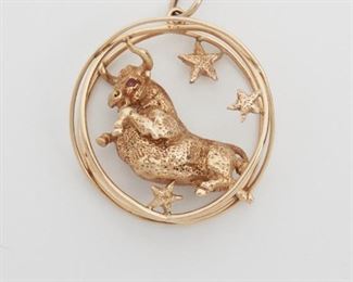 2013
A Ruser Taurus Charm
14k yellow gold; Stamped: Ruser /14k
Designed as a three dimensional bull set with round ruby eyes surrounded by stars
2" L x 1.5" W
28.4 grams
Estimate: $1,500 - $2,000
