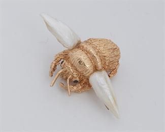 2017
A Ruser Freshwater Pearl And Sapphire Bee Brooch
14k yellow gold; Signed: Ruser
Designed with freshwater pearl wings and small round sapphire eyes
1.1" W x 1.75" H
9 grams
Estimate: $1,000 - $1,500