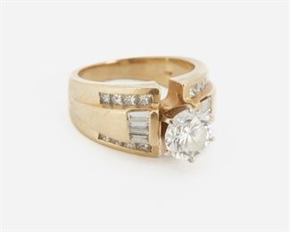 2018
A Diamond Ring
14k yellow gold
Centering a full-cut round diamond gauged at approximately 1.40ct, and graded G-H color and SI2-I1 clarity, flanked by six baguette and sixteen princess-cut diamonds totaling approximately 1.00ct
Ring size: 6
8.7 grams
Estimate: $2,000 - $3,000