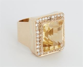 2021
A Citrine And Diamond Ring
14k yellow gold
Centering a rectangular fancy-cut citrine gauged at approximately 16.60ct, surrounded by thirty-four full-cut round diamonds gauged at approximately 0.70ct, and graded G-H color and VS clarity
Ring size: 10.5
23.5 grams
Estimate: $1,000 - $1,500