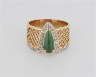 2036
A Jadeite And Diamond Ring
18k yellow gold
Centering a pear-shaped cabochon jadeite surrounded by small round diamonds
Ring size: 8.5
7.92 grams
Estimate: $500 - $700
