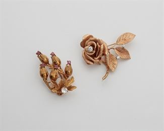2042
Two Diamond And Gem-Set Brooches
14K & 18k rose gold
Comprising a textured 14K rose brooch set with three full-cut round diamonds totaling approximately 0.35ct and graded G-H color, SI1 clarity (2" W x 1.625" H), and an 18k flower blossom ruby and diamond brooch set with one old European-cut diamond gauged at approximately 0.45ct and graded F-G color, I2-I3 clarity (1.75" W x 1" H)
29 grams
2 pieces
Estimate: $800 - $1,200