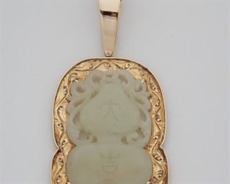 2053
A Chinese Carved Jade Pendant
14k yellow gold
Centering a carved nephrite jade plaque within a gold frame
4.25" L x 2" W
56.84 grams
Estimate: $600 - $800
