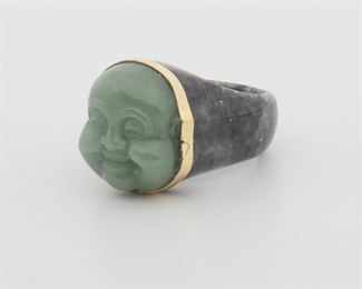 2054
A Carved Jade Buddha Ring
18k yellow gold
Designed as a jadeite jade green Buddha head measuring 19mm x 16.5mm, attached to a carved black jade shank
Ring size: 10.5
15.76 grams
Estimate: $500 - $700