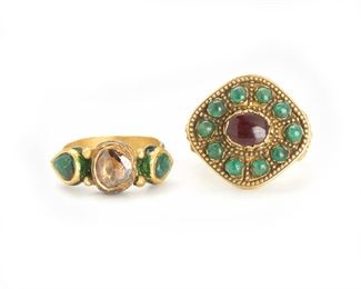 2060
Two Indian Gem-Set Rings
18k yellow gold
Comprising a brown diamond and green stone ring, size: 8.5; and a cabochon red stone and emerald ring, size: 7
20.0 grams
2 pieces
Estimate: $800 - $1,200