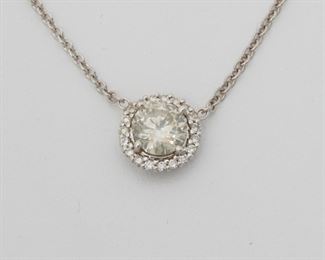 2076
A Diamond Pendant Necklace
18k white gold
Centering a full-cut round diamond weighing 1.01ct, surrounded by nineteen full-cut diamond totaling approximately 0.08ct
20" L
4.4 grams
Estimate: $1,000 - $1,500