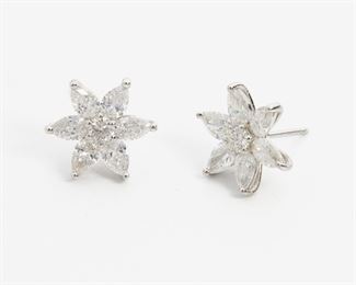 2081
A Pair Of Diamond Flower Earrings
Platinum
Set with twelve pear-shaped diamonds and two full-cut round diamonds totaling 2.72ct
Each: .55" Dia.
5.6 grams
2 pieces
Estimate: $3,500 - $4,500