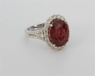 2085
A Tourmaline And Diamond Ring
18k white gold
Centering an oval-cut orange-red tourmaline gauged at approximately 7.00ct and surrounded by fifty-six full-cut round diamonds totaling approximately 1.45ct, and graded H-J color and SI clarity
Ring size: 8
9.3 grams
Estimate: $1,200 - $1,800