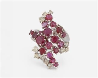 2088
A Ruby And Diamond Ring
18k white gold
Set with seventeen full-cut round rubies totaling 5.33ct, and further set with eleven full-cut round diamonds totaling 0.97ct and graded J-K color and VS clarity
Ring size: 7.5
11. 2 grams
Estimate: $1,000 - $1,500