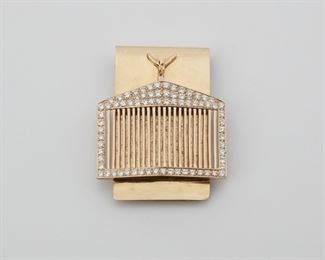 2106
A Rolls Royce Diamond Money Clip
14k yellow gold
Set with seventy-four full-cut round diamonds totaling approximately 4.75ct and graded H-I color, SI-I1 clarity
1.875" W x 2.375" H
47 grams
Estimate: $1,200 - $1,800